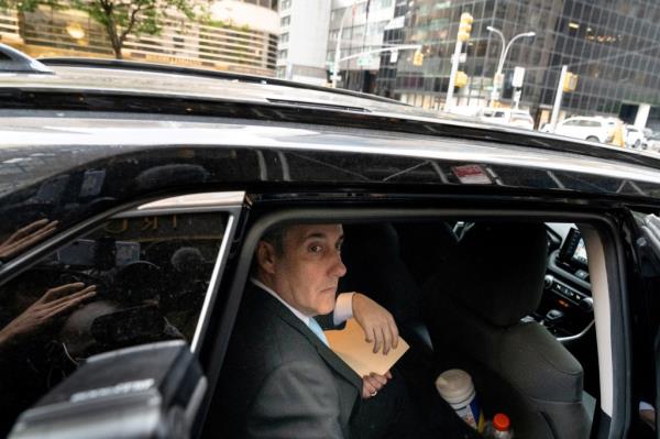 Michael Cohen departs to testify in the trial Tuesday.