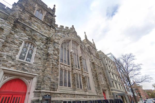 Stone building of The Abyssinian Baptist Church with a red door