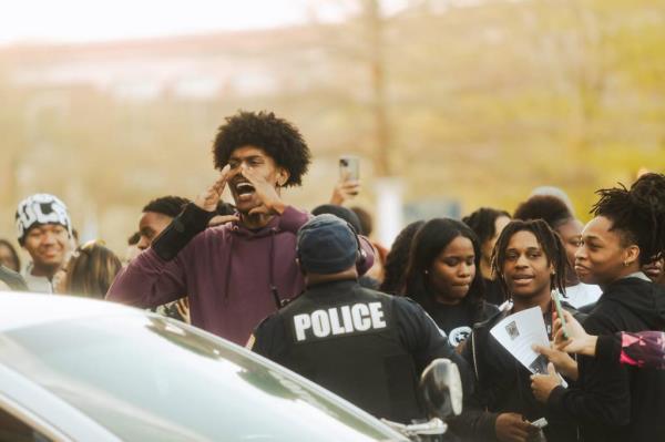 University of Memphis students chant as they gathered on campus to protest the appearance of Kyle Rittenhouse.