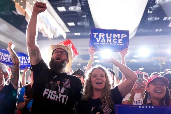 Supporters cheer as Republican presidential nominee former President Do<em></em>nald Trump arrives for a campaign rally at the Gaylord Rockies Resort & Co<em></em>nvention Center, Friday, Oct. 11, 2024, in Aurora, Colo. 