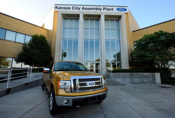 A Ford F-150 Lariat pickup sits outside the Kansas City Ford Assembly plant .