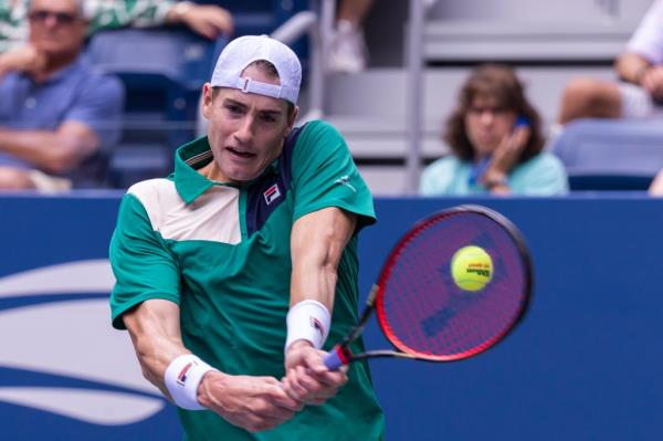 John Isner returns a volley against Fecundo Diaz Acosta of Argentina during their first round 2023 US Open Tennis tournament on Tuesday.