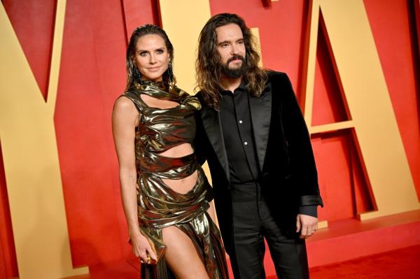 Heidi Klum, Tom Kaulitz attend the 2024 Vanity Fair Oscar Party Hosted By Radhika Jo<em></em>nes at Wallis Annenberg Center for the Performing Arts on March 10, 2024 in Beverly Hills, California.