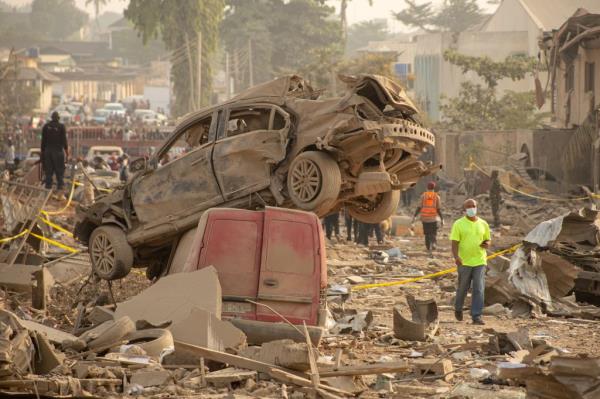 Car wreckages sit on top of rubbles after an explosion in Ibadan, Oyo State, Nigeria, 17 January 2024. 