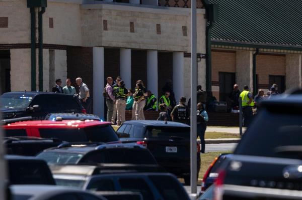 Law enforcement and first respo<em></em>nders outside of Apalachee High School after the shooting.