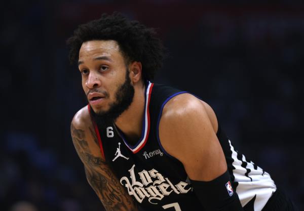 Amir Coffey #7 of the LA Clippers waits to play