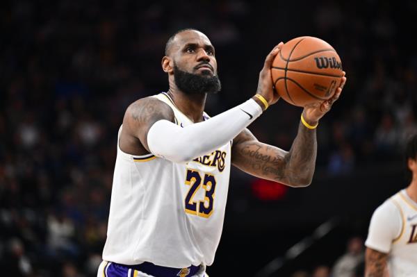 LeBron James #23 of the Los Angeles Lakers shoots a free throw during the game against the Utah Jazz on December 1, 2024 at Delta Center in Salt Lake City, Utah.