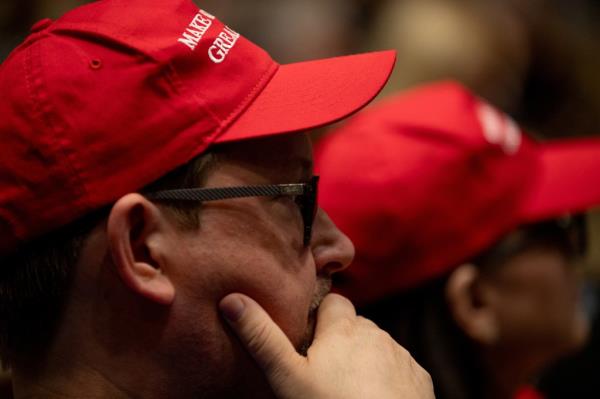 People gathered at the Michigan Co<em></em>nservative Coalition watch party, observing the first presidential debate between Joe Biden and Do<em></em>nald Trump