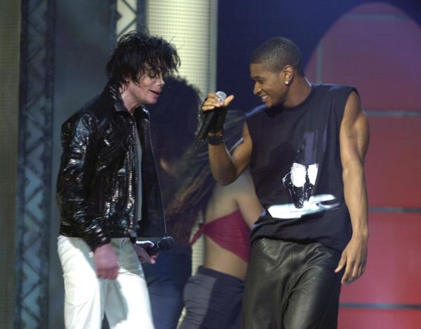 Usher joined Michael for a performance of “You Rock My World” during the 30th Anniversary Show at Madison Square Garden on September 10, 2001.