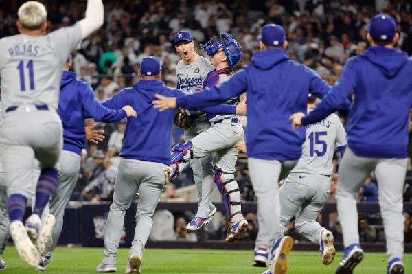 The Los Angeles Dodgers defeat the New York Yankees 7-6 to win the World Series.