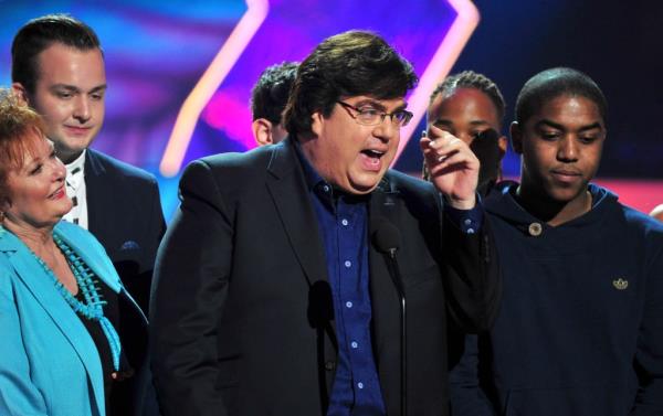 Dan Schneider in 2014 accepting the Nickelodeon Lifetime Achievement Award o<em></em>nstage during Nickelodeon's 27th Annual Kids Choice Awards.