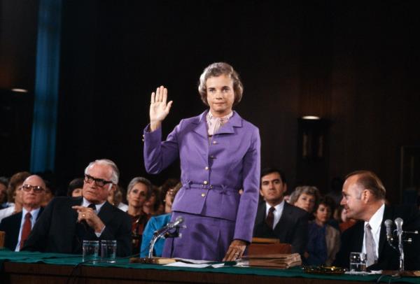 Sandra Day O'Co<em></em>nnor is sworn in before the Senate Judiciary Committee during co<em></em>nfirmation hearings as she seeks to become the first woman to take a seat on the US Supreme Court.