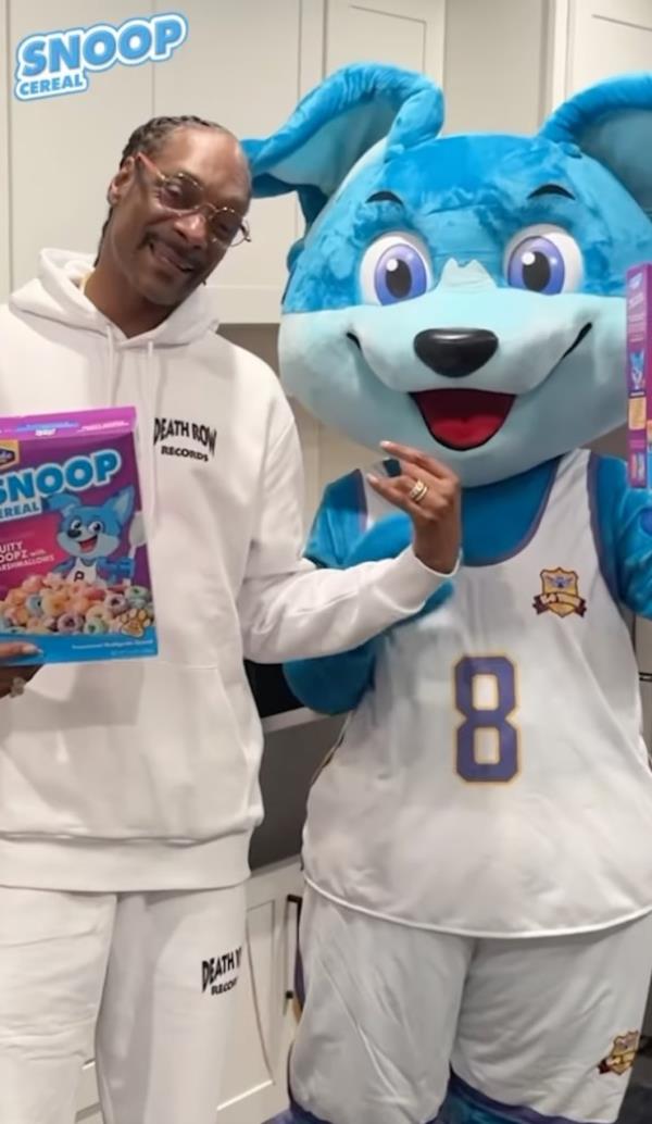 Snoop Dogg with his cereal brand and mascot. 