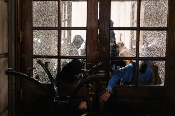 Protesting students storm and occupy Hamilton Hall at Columbia University early Tuesday.