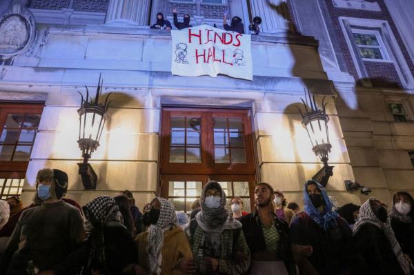 Students refuse to move from outside the occupied building.