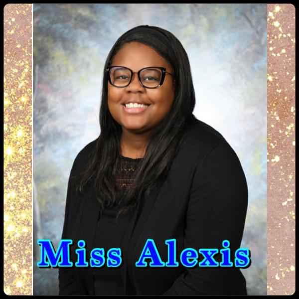 Alexis Breeden, seen in headshot photo wearing black and glasses, seen smiling with 