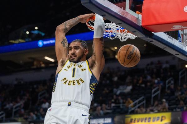 Indiana Pacers forward Obi Toppin (1) slam dunks the ball in the second half against the Cleveland Cavaliers at Gainbridge Fieldhouse. 