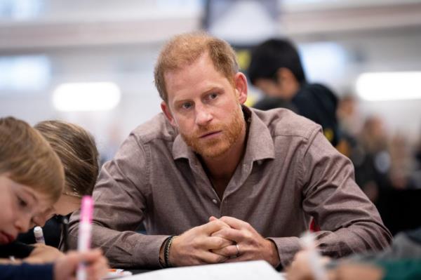 Prince Harry, the Duke of Sussex, interacting with elementary school students during the Invictus Games 2025 School Program Launch Event in Vancouver, Canada.