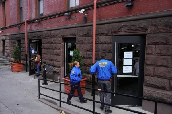 Members of the New York City Police Department visit the Hostelling Internatio<em></em>nal New York City Hostel in the Upper West Side for a suspected killer of UnitedHealthcare CEO Brian Thompson on Thursday, December 5, 2024.