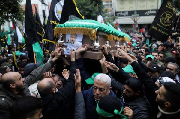 The coffin of Hamas deputy chief Saleh al-Arouri is carried as supporters of Hamas movement and other Palestinian and Lebanese political factions gathered in Tarik al-Jadide area during his funeral on January 4, 2024 in Beirut, Lebanon.