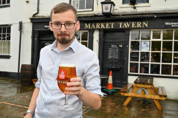 Jon May, 25, set himself a challenge to drink 2000 pints in 200 days and he celebrates with his final pint at The Market Tavern in Atherstone. October 20, 2023. Photo released - October 20 2023. See SWNS story SWNJpints. A beer-lover has completed an epic drinking challenge to sink 2,000 pints in 200 days - costing him a staggering 18,000. Jon May has been necking 10 pints a day for the past six-and-a-half mo<em></em>nths and says he hasn't had a single hangover so far. The 25-year-old decided to embark on the marathon pub crawl after seeing someone on Tiktok trying to drink 1,000 pints in a year. He recko<em></em>ned he could stomach double the amount and today (Fri) completed his beer-drinking quest at The Market Tavern in Atherstone, Warks. Jon has mainly been drinking in dozens of boozers around his home town of Guildford, Surrey, and has been docu<em></em>menting his progress on Tiktok. While carrying out his challenge, which has seen him co<em></em>nsume more than 360,000 calories, his number of followers has risen from 6,000 to 123,000. Tiktok influencer Jon reckons he has forked out around 8,000 on lager and cider and a further 10,000 on catching Ubers to and from the pub.