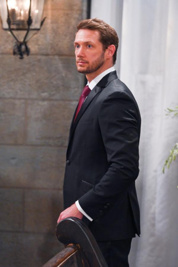 Johnny Wactor in a suit on the set of General Hospital, episode 14811