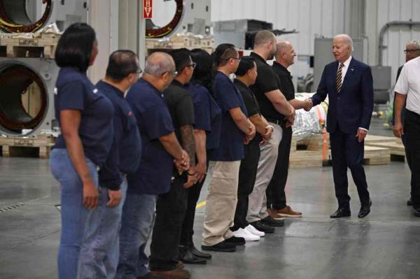 President Biden greets employees as he tours Ingeteam, Inc. in Milwaukee, Wisconsin.