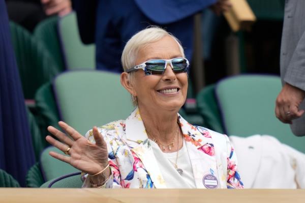 Martina Navratilova waves during the Wimbledon women's singles final on July 13, 2024.