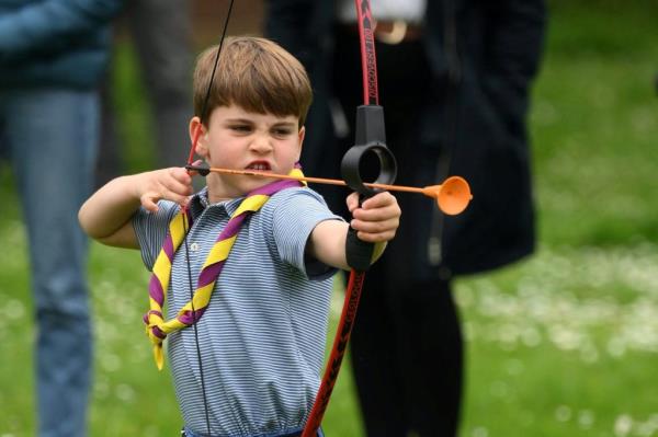 Prince Louis of Wales trying archery at the 3rd Upton Scouts Hut in Slough, during the Big Help Out event