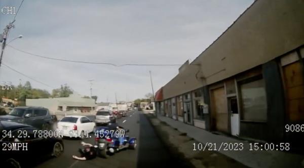 The female passenger fell to the ground face first into the path of  the city bus after the biker had to swerve to avoid a rear-end accident. 