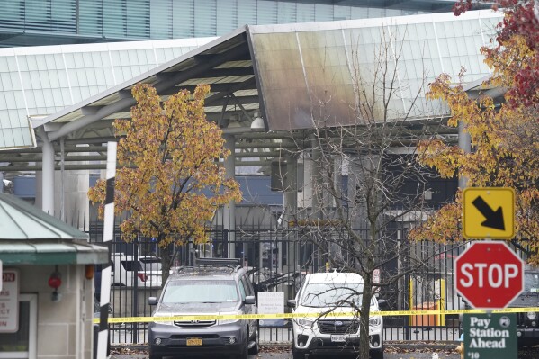 Fire damage is visible to the customs plaza structure at the Rainbow Bridge border crossing, Wednesday, Nov. 22, 2023, in Niagara Falls, N.Y. The border crossing between the U.S. and Canada has been closed after a vehicle exploded at a checkpoint on a bridge near Niagara Falls. The FBI's field office in Buffalo said in a statement that it was investigating the explosion on the Rainbow Bridge, which co<em></em>nnects the two countries across the Niagara River. (Derek Gee/The Buffalo News via AP)