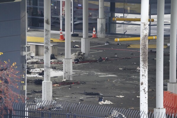 Debris is scattered a<em></em>bout inside the customs plaza at the Rainbow Bridge border crossing, Wednesday, Nov. 22, 2023, in Niagara Falls, N.Y. The border crossing between the U.S. and Canada has been closed after a vehicle exploded at a checkpoint on a bridge near Niagara Falls. The FBI's field office in Buffalo said in a statement that it was investigating the explosion on the Rainbow Bridge, which co<em></em>nnects the two countries across the Niagara River. (Derek Gee/The Buffalo News via AP)