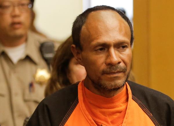 Juan Francisco Lopez-Sanchez is led into the Hall of Justice for his arraignment in San Francisco, California July 7, 2015.