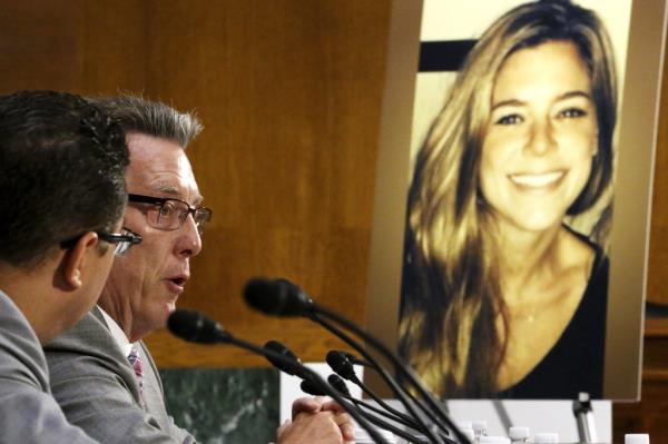 Jim Steinle (L), father of murder victim Kathryn Steinle (in photo, R), allegedly at the hands of an undocu<em></em>mented immigrant, testifies a<em></em>bout his daughter's murder during a hearing of the Senate Judiciary Committee on U.S. immigration enforcement policies, on Capitol Hill in Washington July 21, 2015.