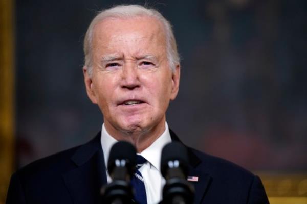 President Joe Biden delivered remarks on Tuesday afternoon from the State Dining Room of the White House