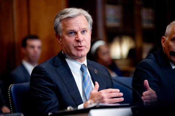 FBI Director Christopher Wray speaks during an Election Threats Task Force meeting at the Justice Department on September 4, 2024 in Washington, DC.