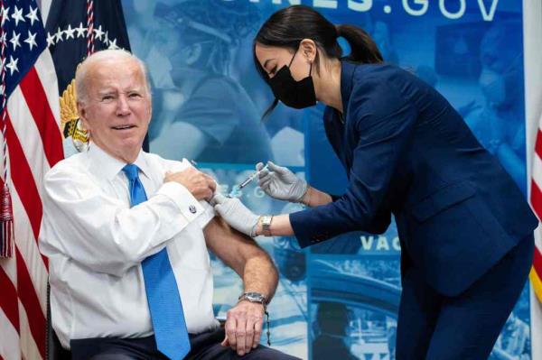 President Biden receiving a COVID-19 vaccine.