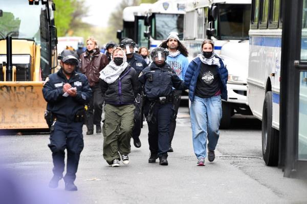 Pro-Palestine protesters gather as the NYPD load buses with those arrested last week.