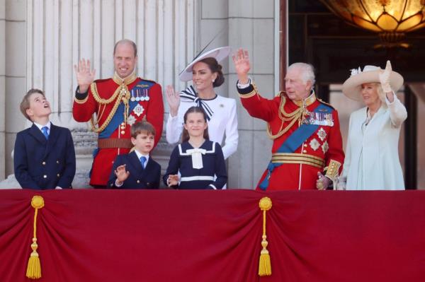 Prince Charles, Queen Camilla, Prince William, and Prince George in military uniforms at the Trooping the Colour ceremony at Buckingham Palace