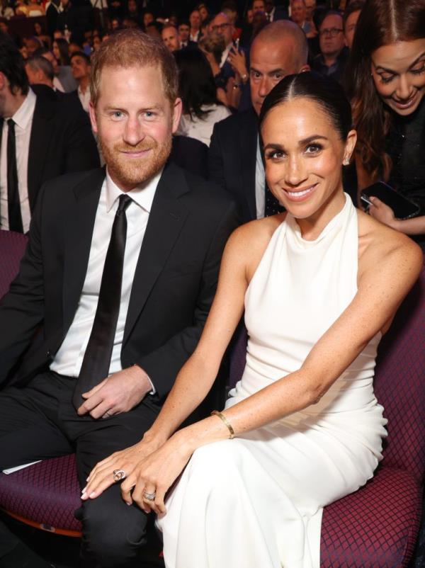 Prince Harry and Meghan, Duchess of Sussex, sitting together at the 2024 ESPY Awards in Hollywood, California.