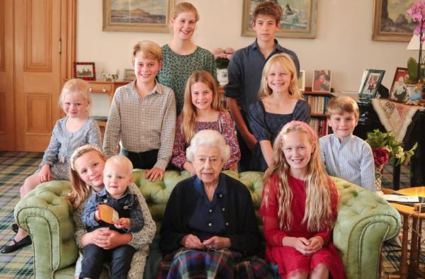 Queen Elizabeth II posing with her grandchildren and great-grandchildren at Balmoral Castle in Aberdeen, Scotland for her 97th birthday