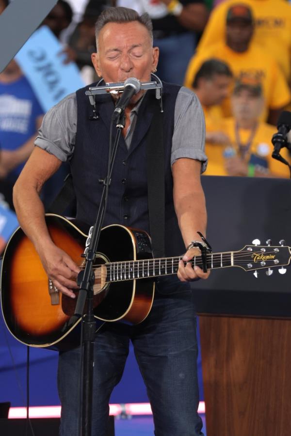 The former president and vice president were surrounded by star power at the Atlanta get-out-the-vote rally, which included a performance by Bruce Springsteen