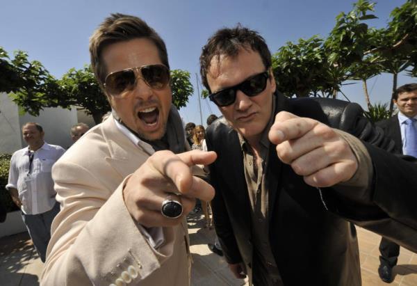 Quentin Tarantino and Brad Pitt pose during the photocall of the movie 