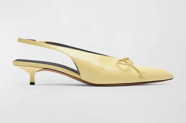 An image of pale yellow Jacquemus slingbacks