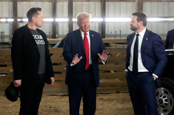 Tesla and SpaceX CEO Elon Musk, from left, Republican presidential nominee former President Do<em></em>nald Trump and Republican vice presidential nominee Sen. JD Vance, R-Ohio, attend a campaign event at the Butler Farm Show, Saturday, Oct. 5, 2024, in Butler, Pa.