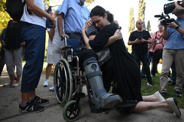 A crowd gathers at the memorial service for Vivian Silver in Tel Gezer, Israel on Thursday.