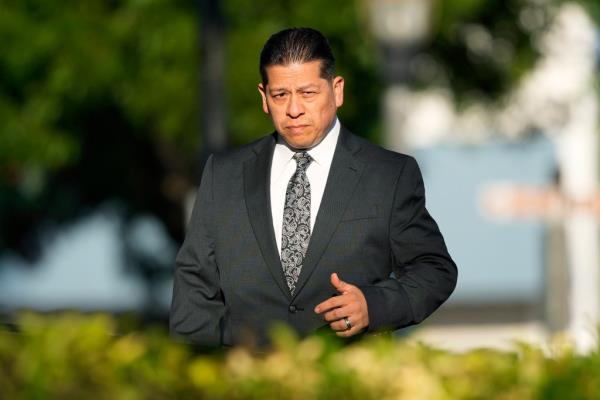 Former Uvalde Co<em></em>nsolidated Independent School District police officer Adrian Go<em></em>nzales arrives at the Uvalde County Courthouse