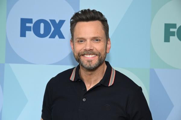 Joel McHale smiling. 