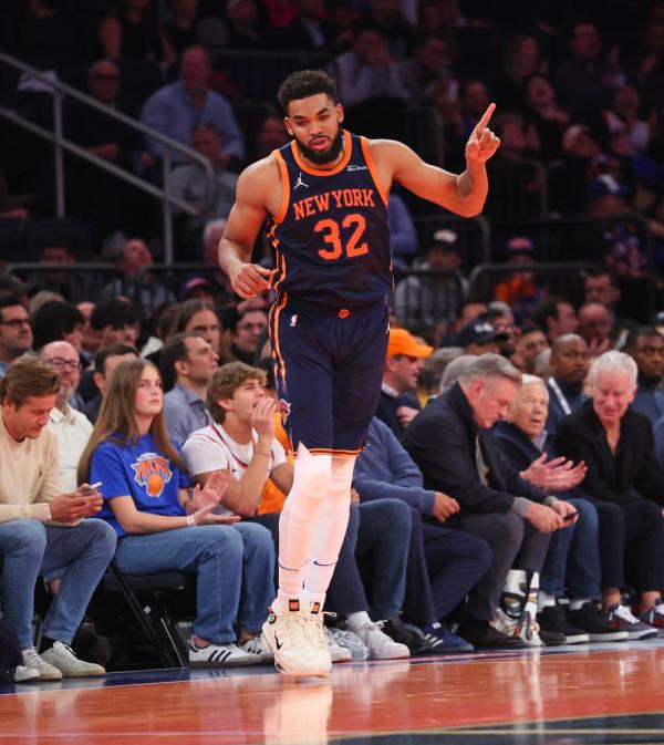 Karl-Anthony Towns #32 of the New York Knicks reacts after hitting a shot during the second half when the New York Knicks defeated the Orlando Magic 121-106 Tuesday, December 3, 2024 at Madison Square Garden in Manhattan, NY.