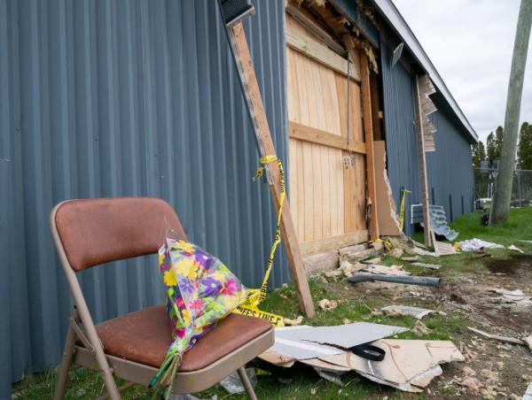 Flowers were left at a scene on Sunday, April 21, 2024 wher<em></em>e an alleged drunk driver smashed through a wall at the Swan Boat Club.